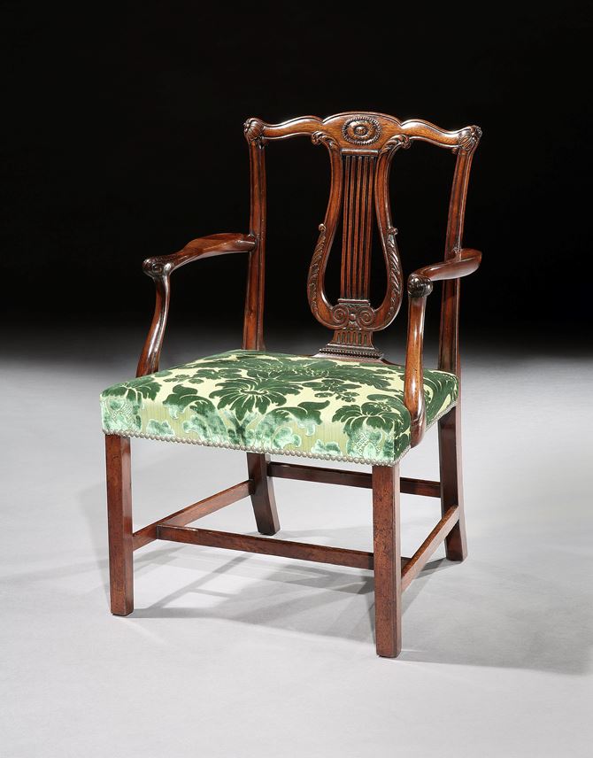 A SET OF TWELVE GEORGE III DINING CHAIRS ATTRIBUTED TO THOMAS CHIPPENDALE | MasterArt